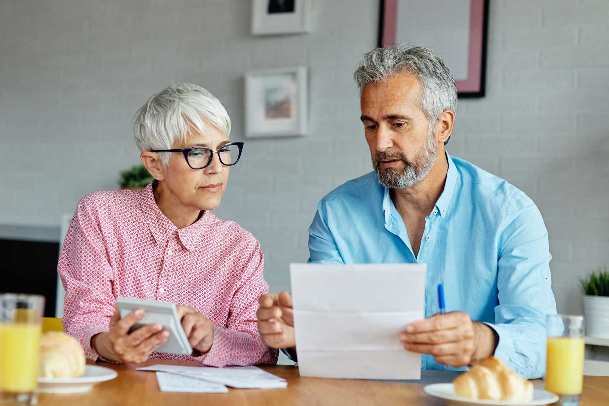 couple-looking-at-finances