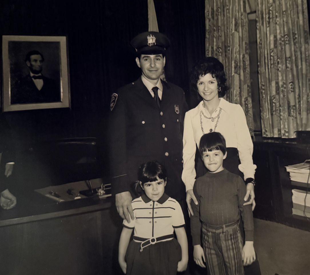 Robert with his parents and sister